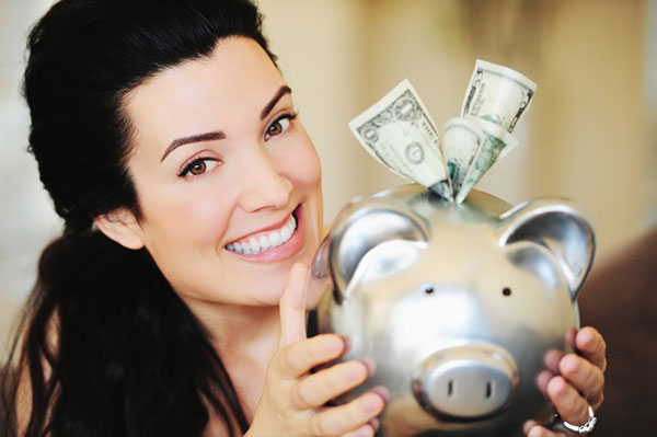 smiling-woman-saving-money